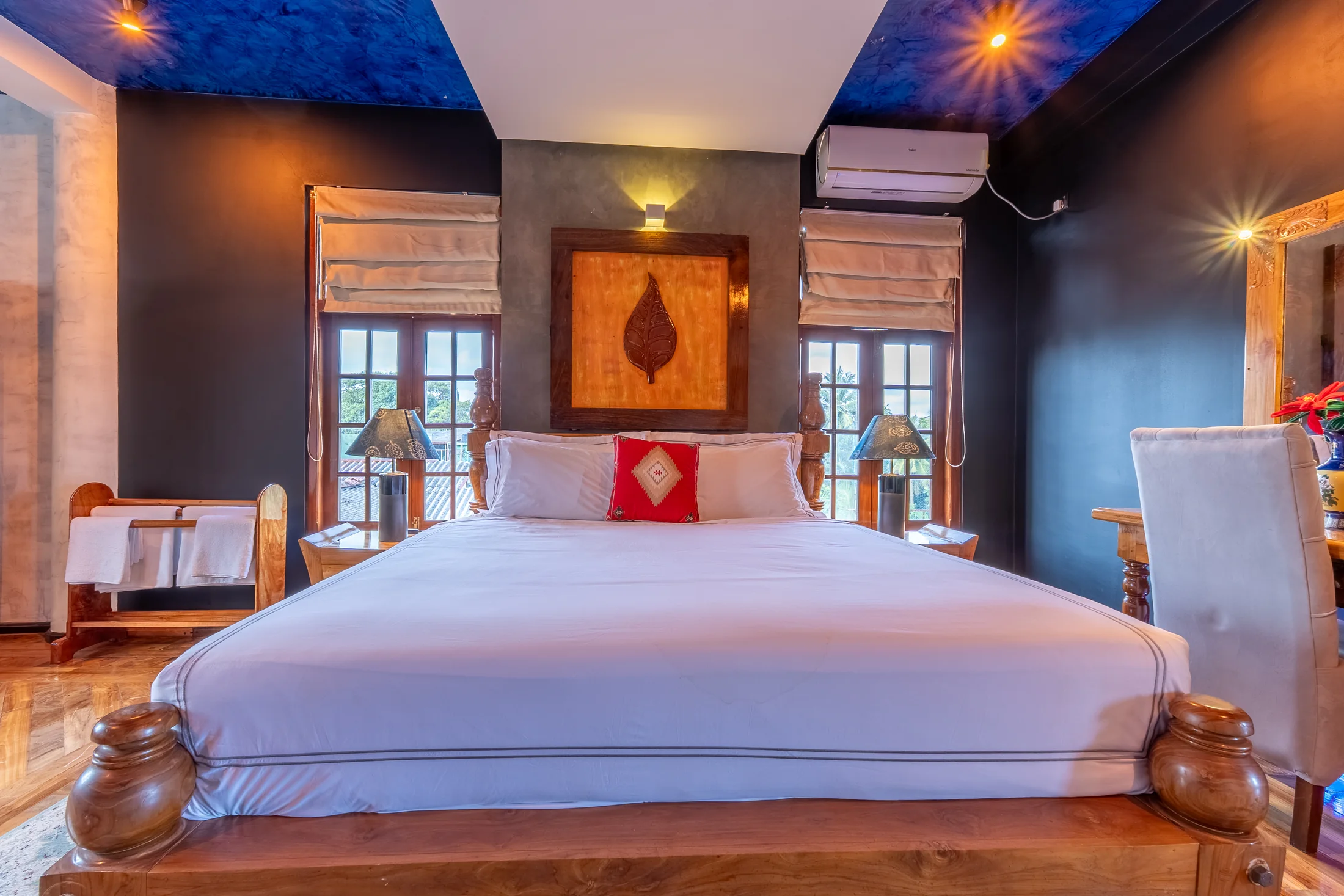 Serene bedroom framed by rich timber and soft natural light