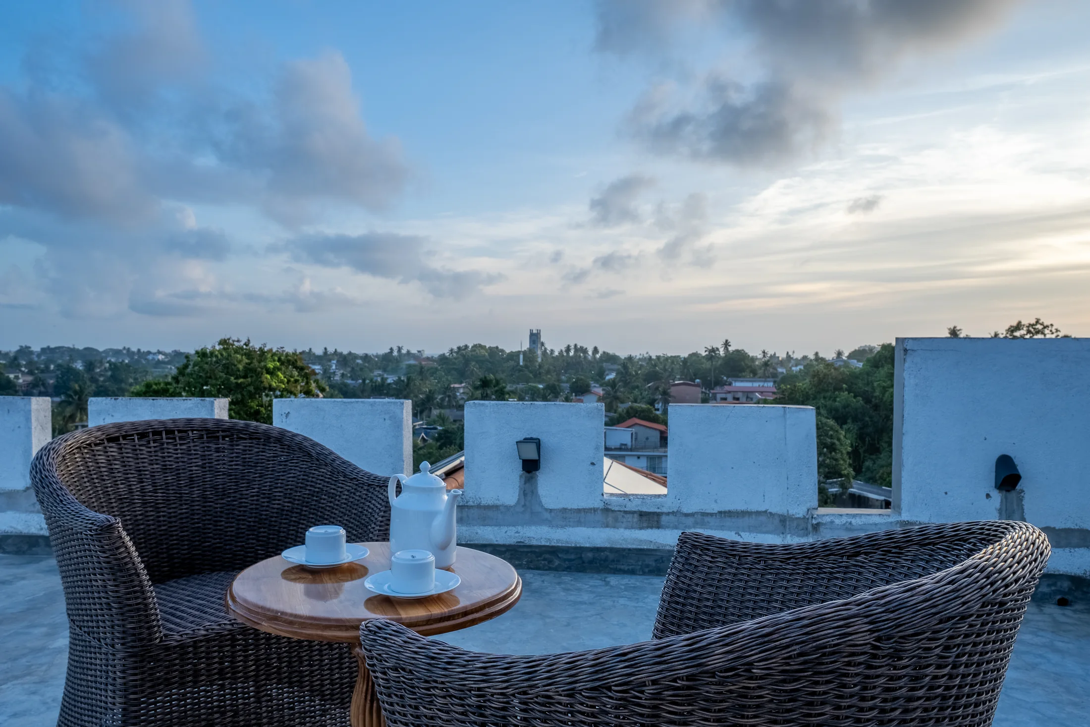 Tea setting on the private rooftop at sunset